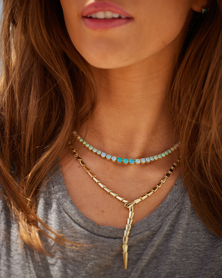 not-your-basic-graduated-ombre-tennis-necklace-16-inch-in-gold-and-blue-opal-ombre