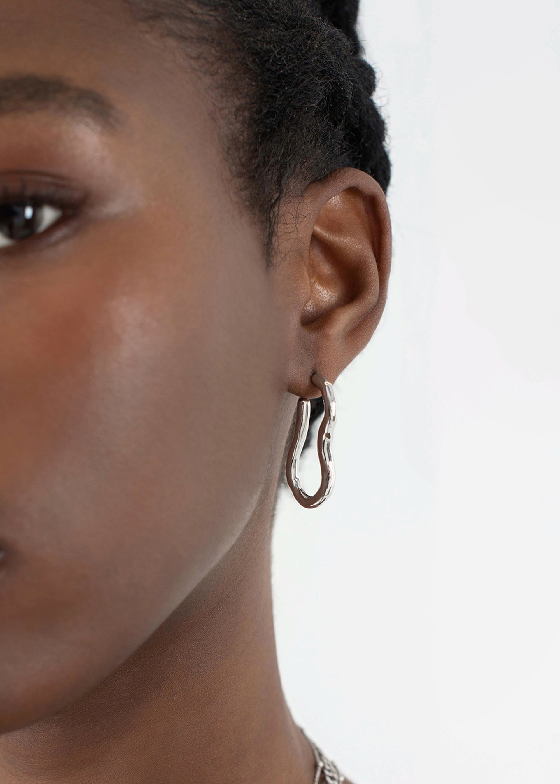 Molten Ovate silver-plated hoop earrings