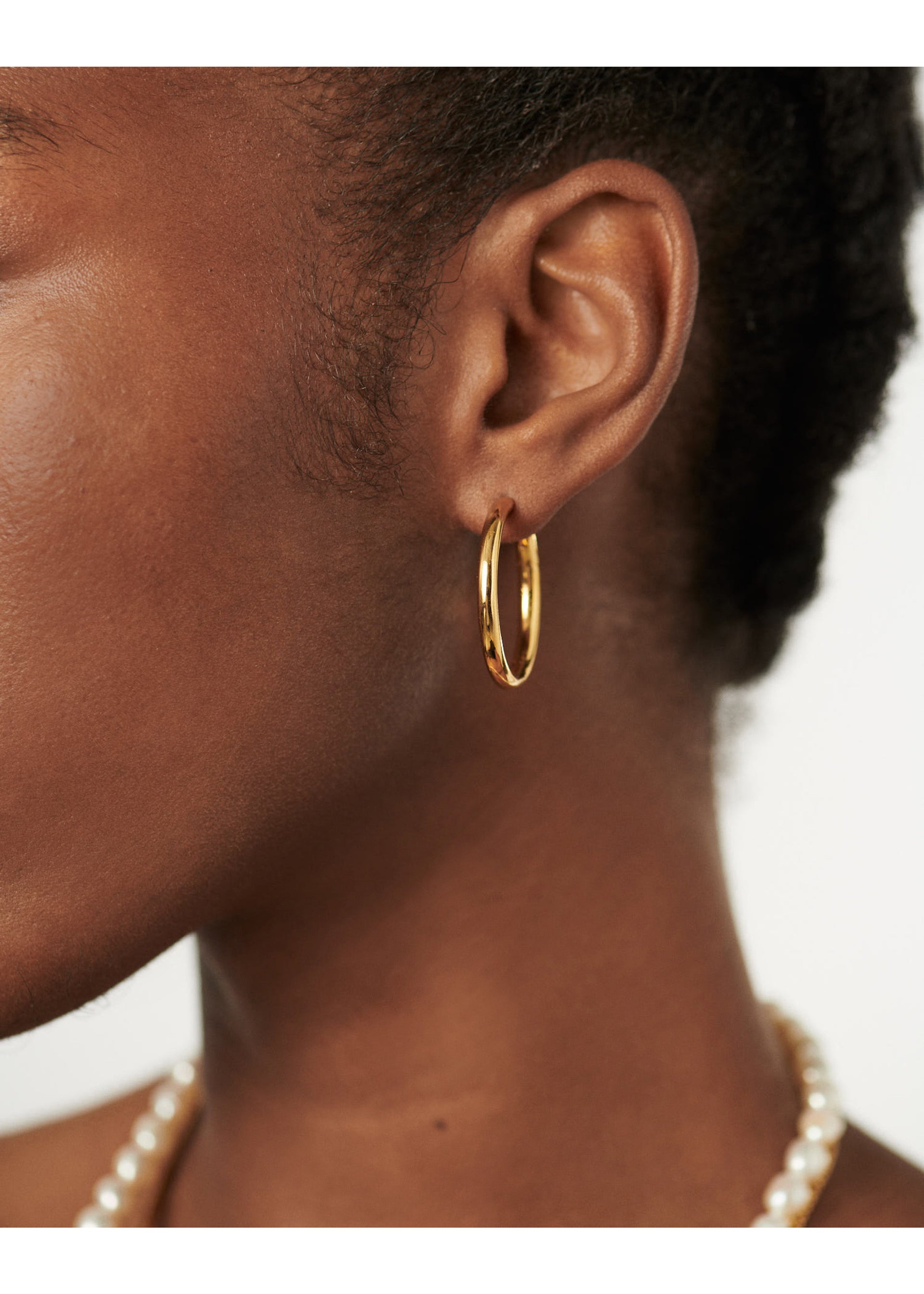 Tunnel large 18kt gold-plated hoop earrings