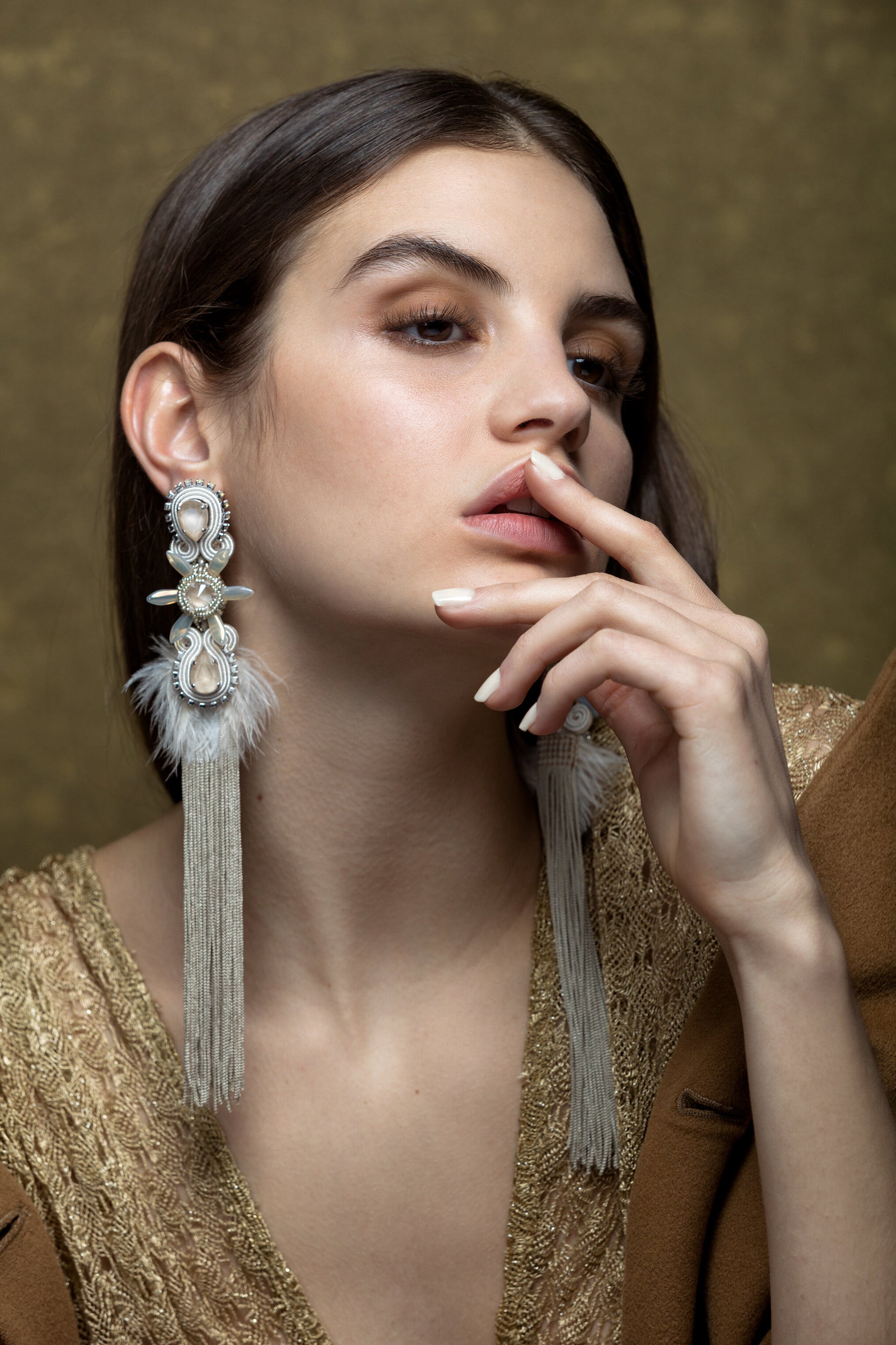 feathered-ivory-tassel-earrings