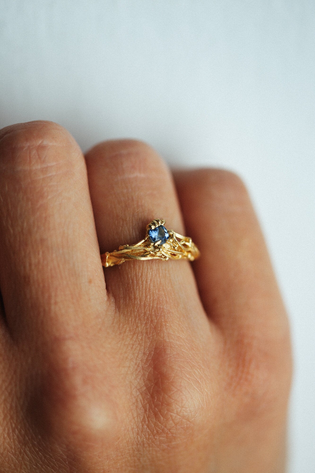 odyssey-blue-sapphire-and-gold-engagement-ring