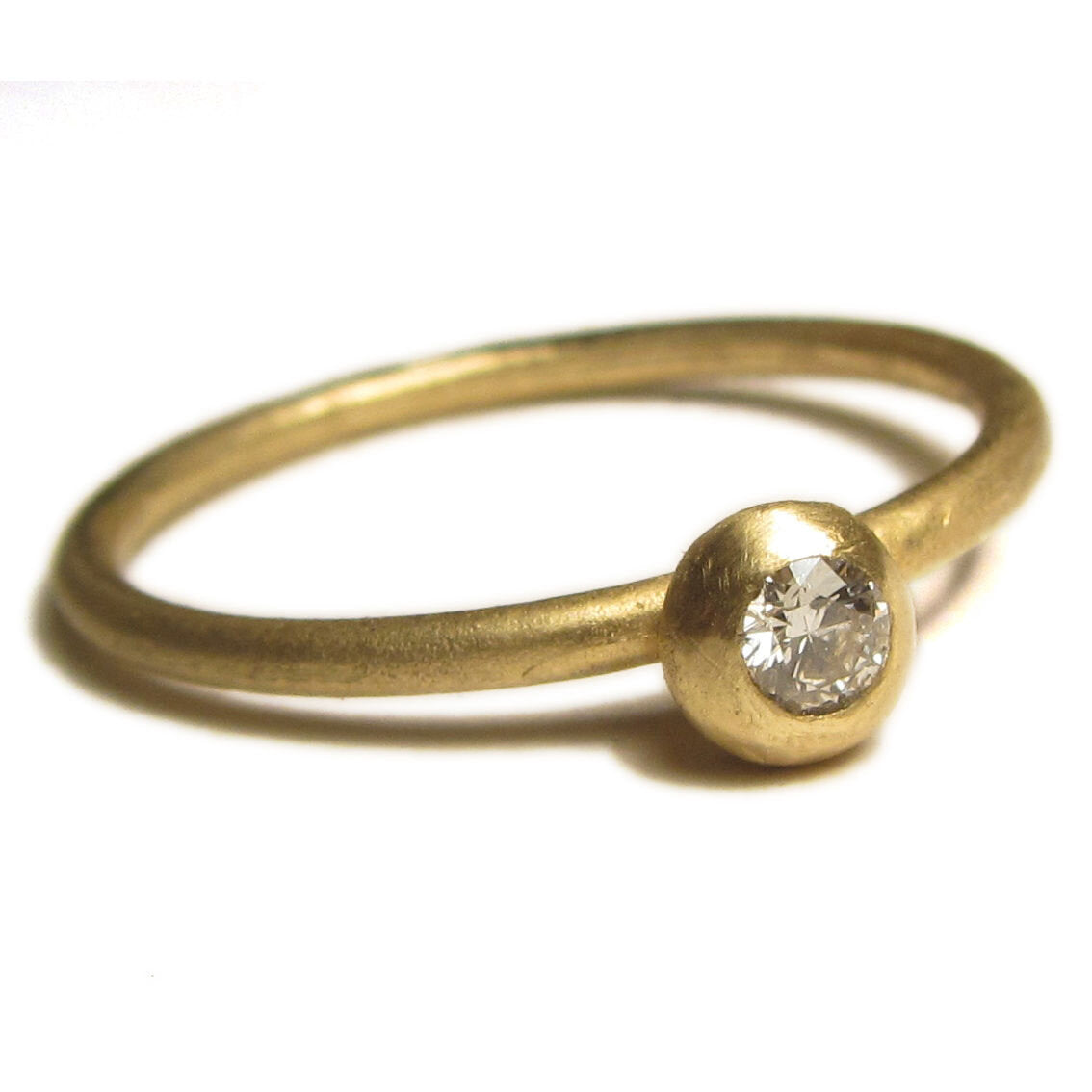 18k-yellow-gold-stacking-ring-with-a-diamond