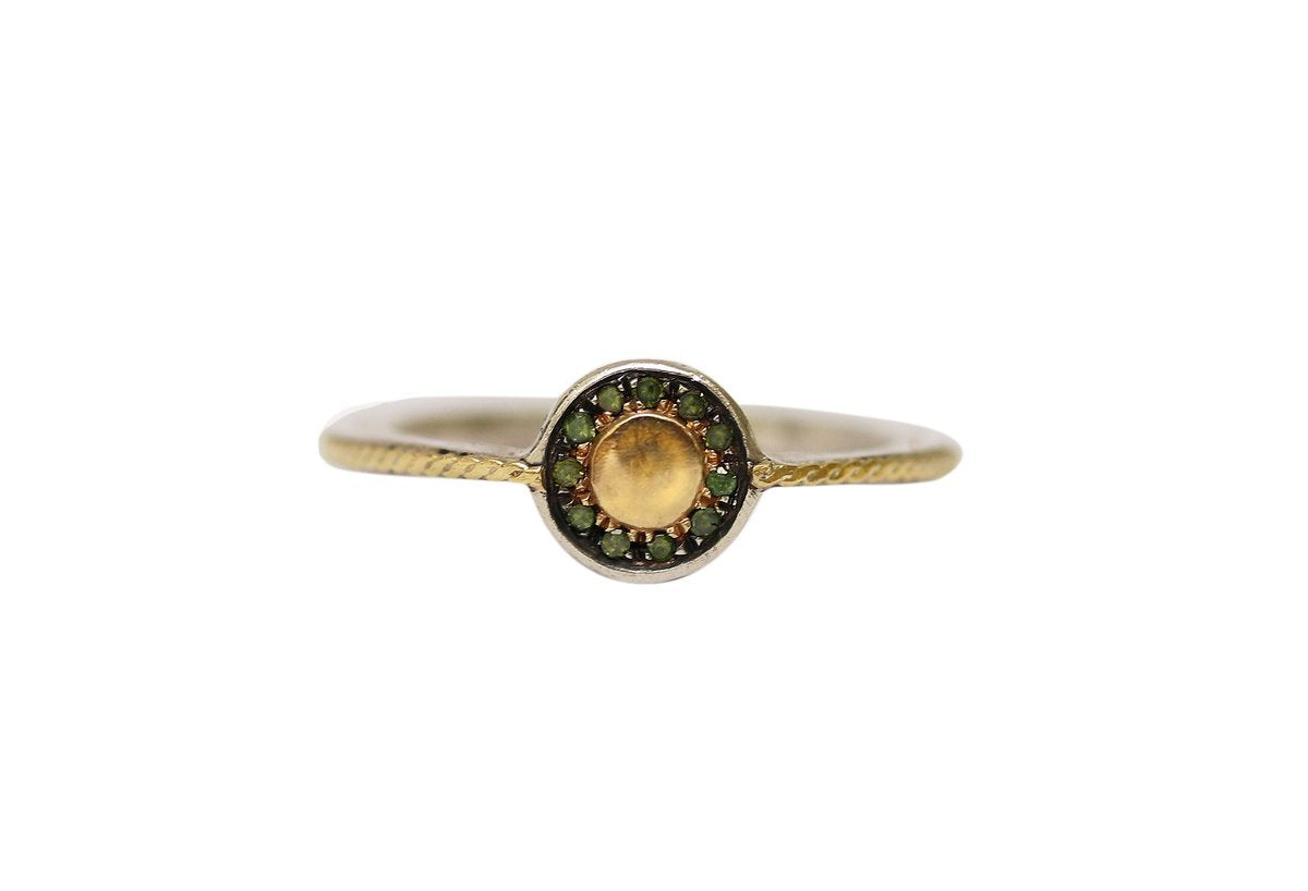 green-sunburst-ring