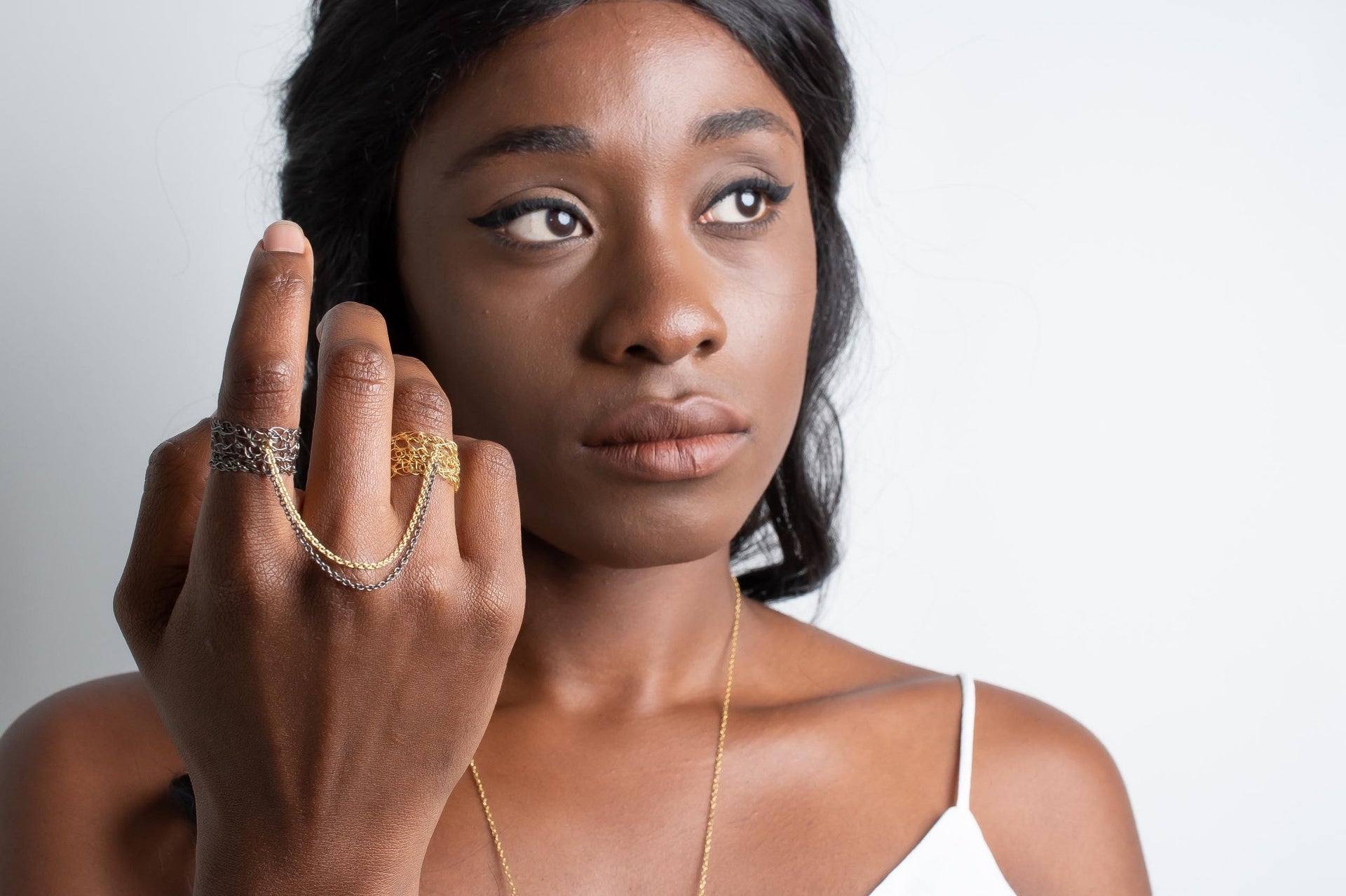 yellow-gold-and-black-rhodium-double-finger-bond-rings