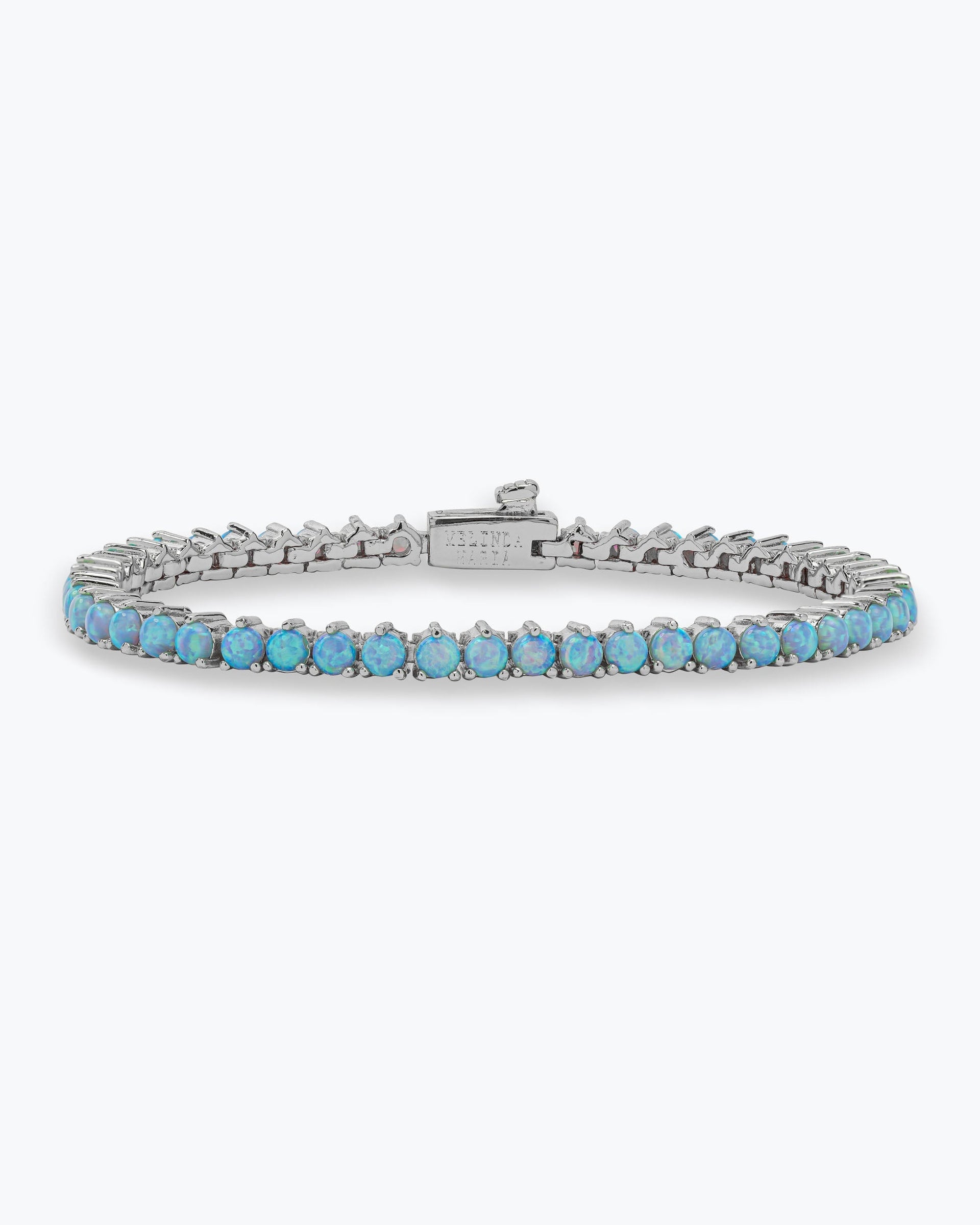 not-your-basic-tennis-bracelet-in-silver-and-blue-opal