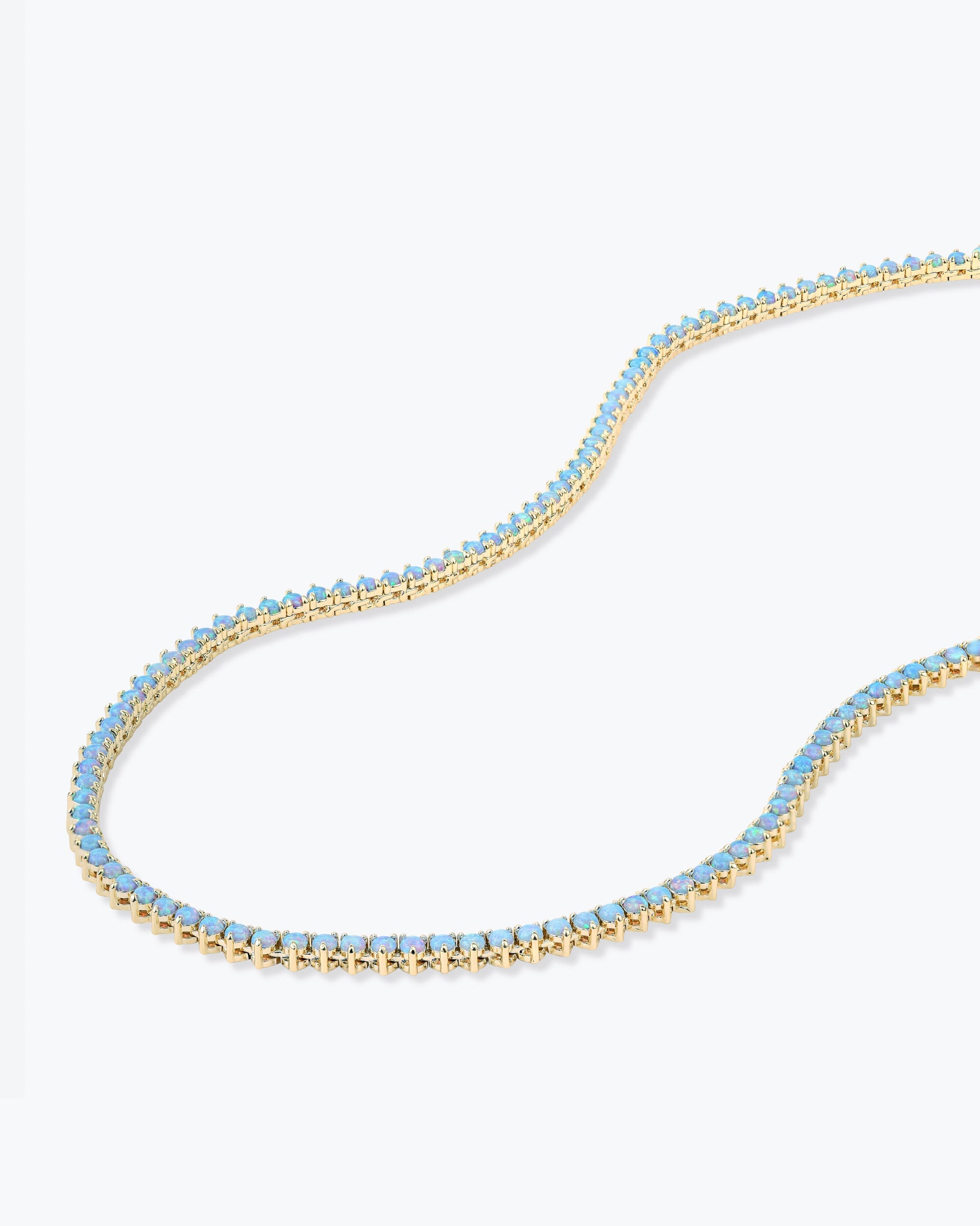 not-your-basic-tennis-necklace-16-inch-in-gold-and-blue-opal