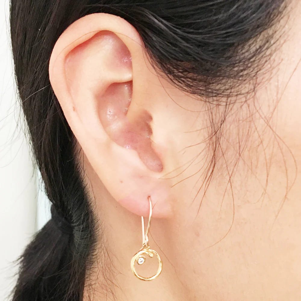 branch-circle-seed-pod-solitaire-earrings