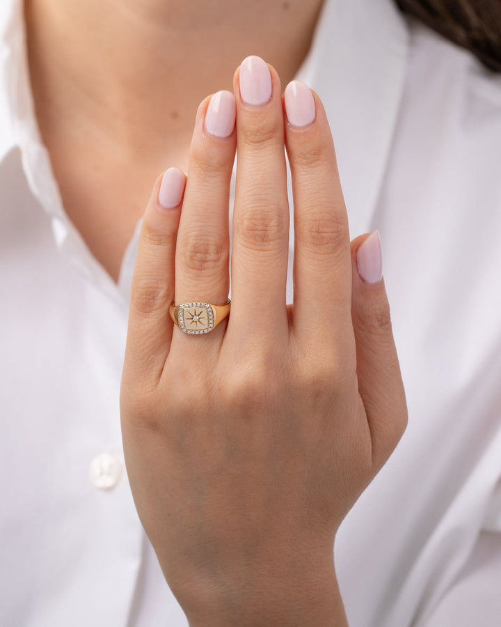 diamond-halo-starburst-signet-ring