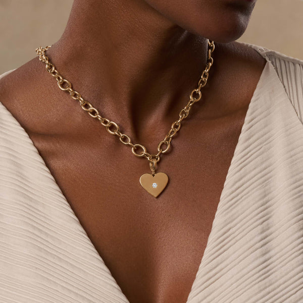 Blissful Embrace Gold Heart Charm