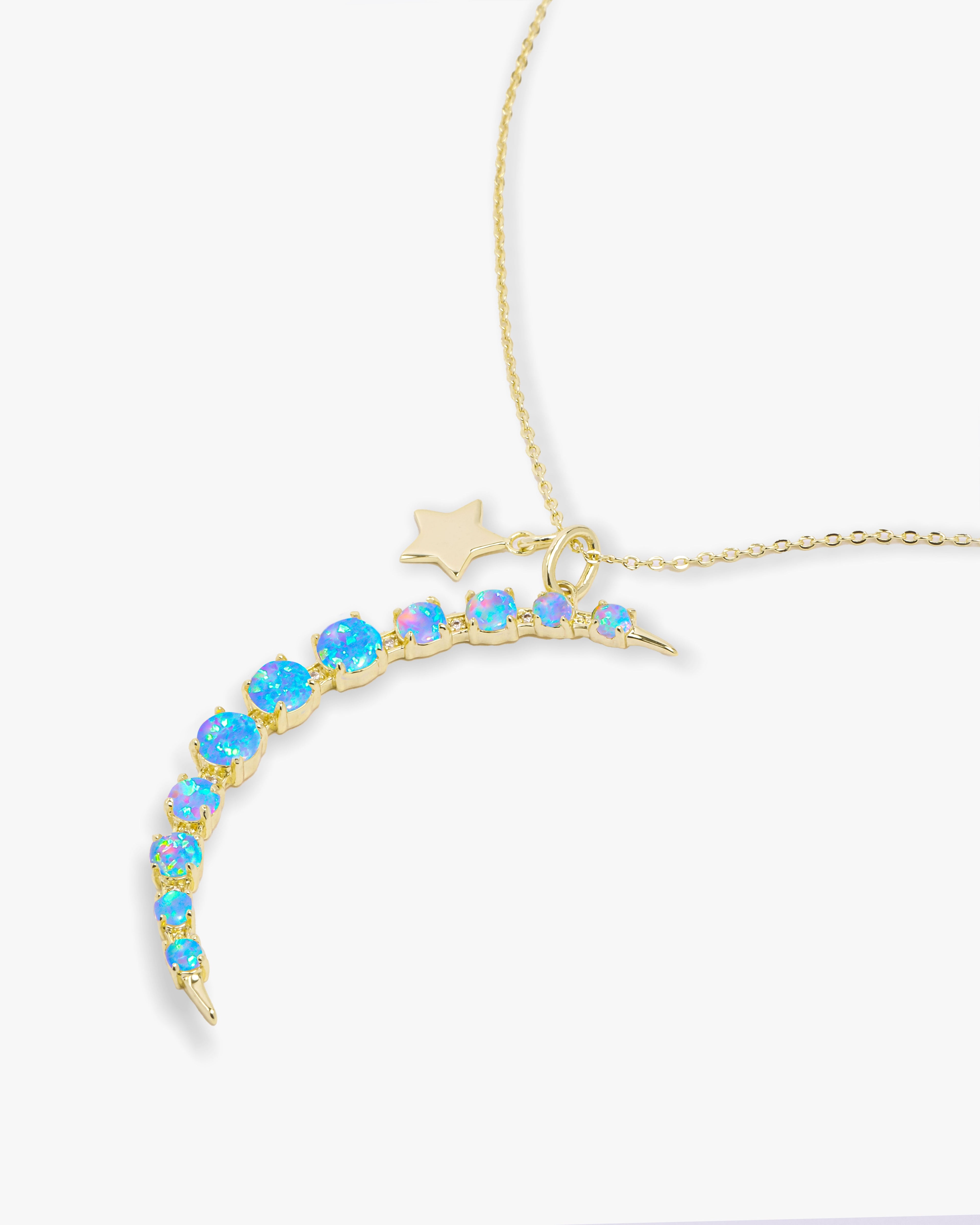 what-dreams-are-made-of-necklace-in-gold-and-blue-opal