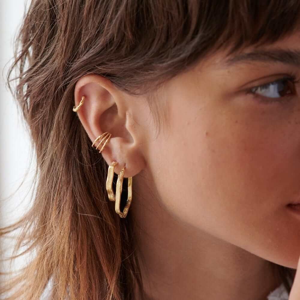 midi-wavy-snake-hoop-earrings-daisy-london