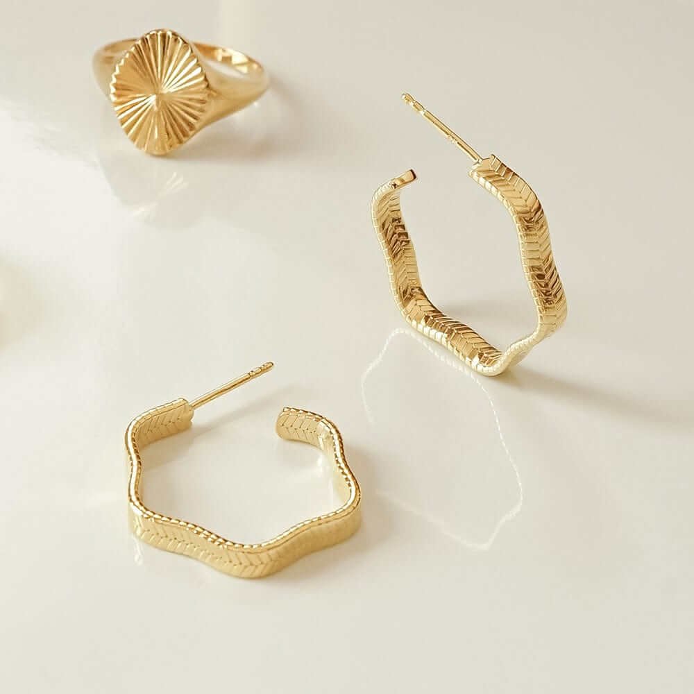 midi-wavy-snake-hoop-earrings-daisy-london