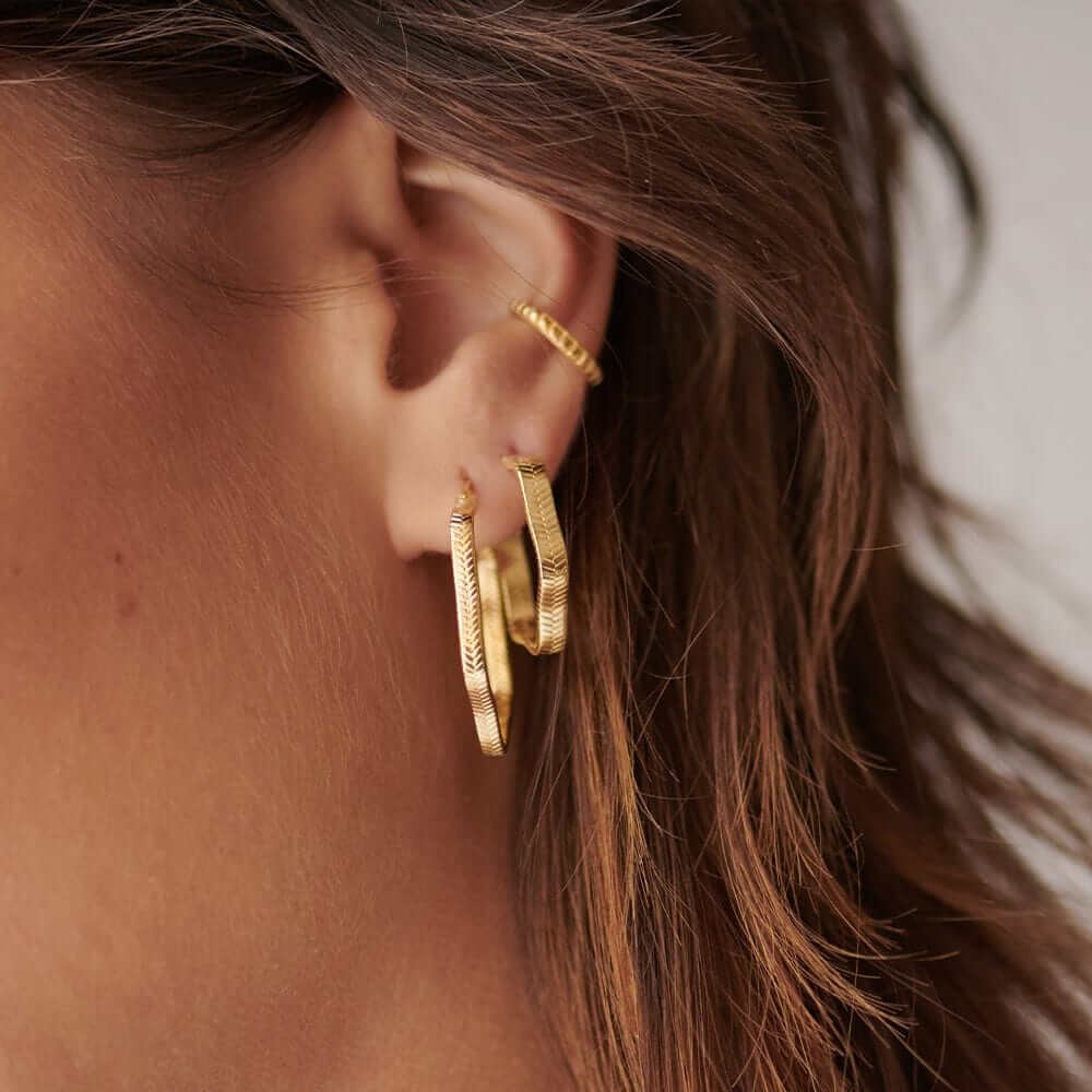 midi-wavy-snake-hoop-earrings-daisy-london