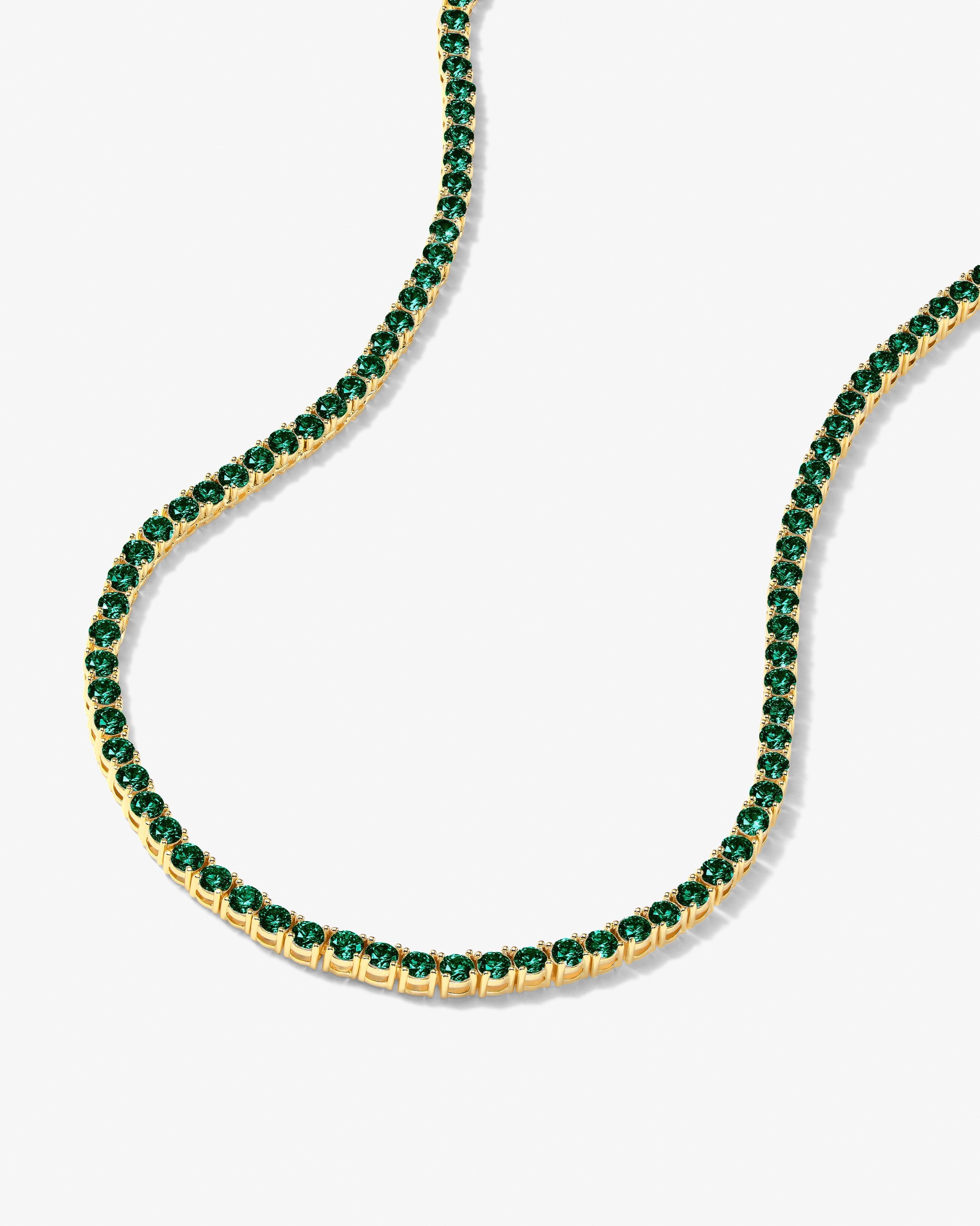 grand-heiress-tennis-necklace-in-gold-and-emerald