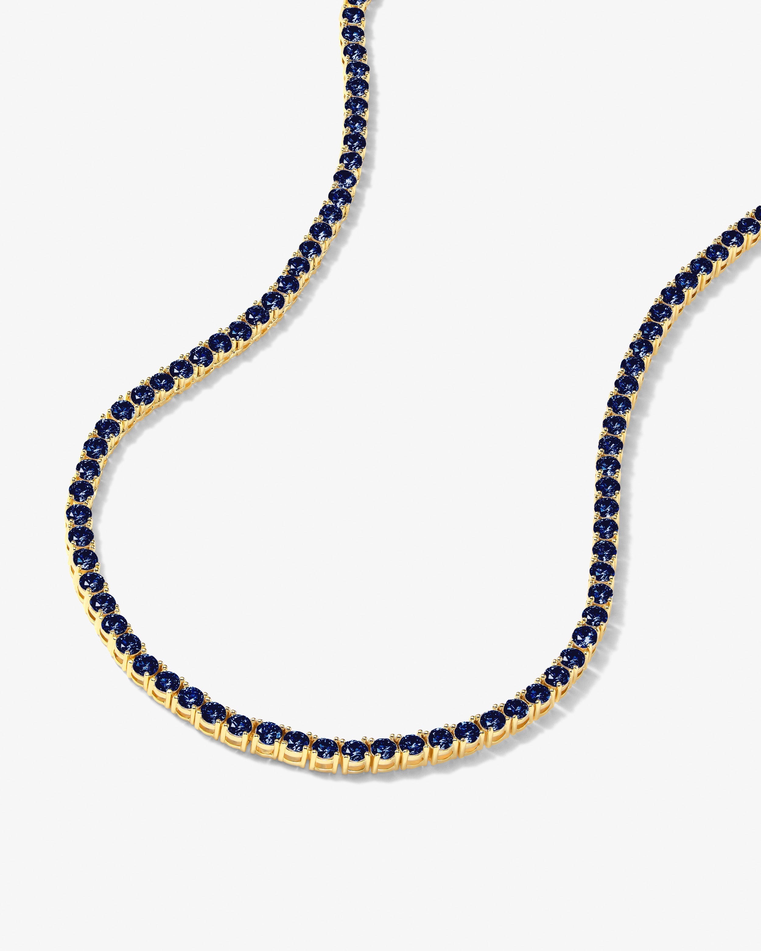 grand-heiress-tennis-necklace-in-gold-and-blue-sapphire-diamondettes