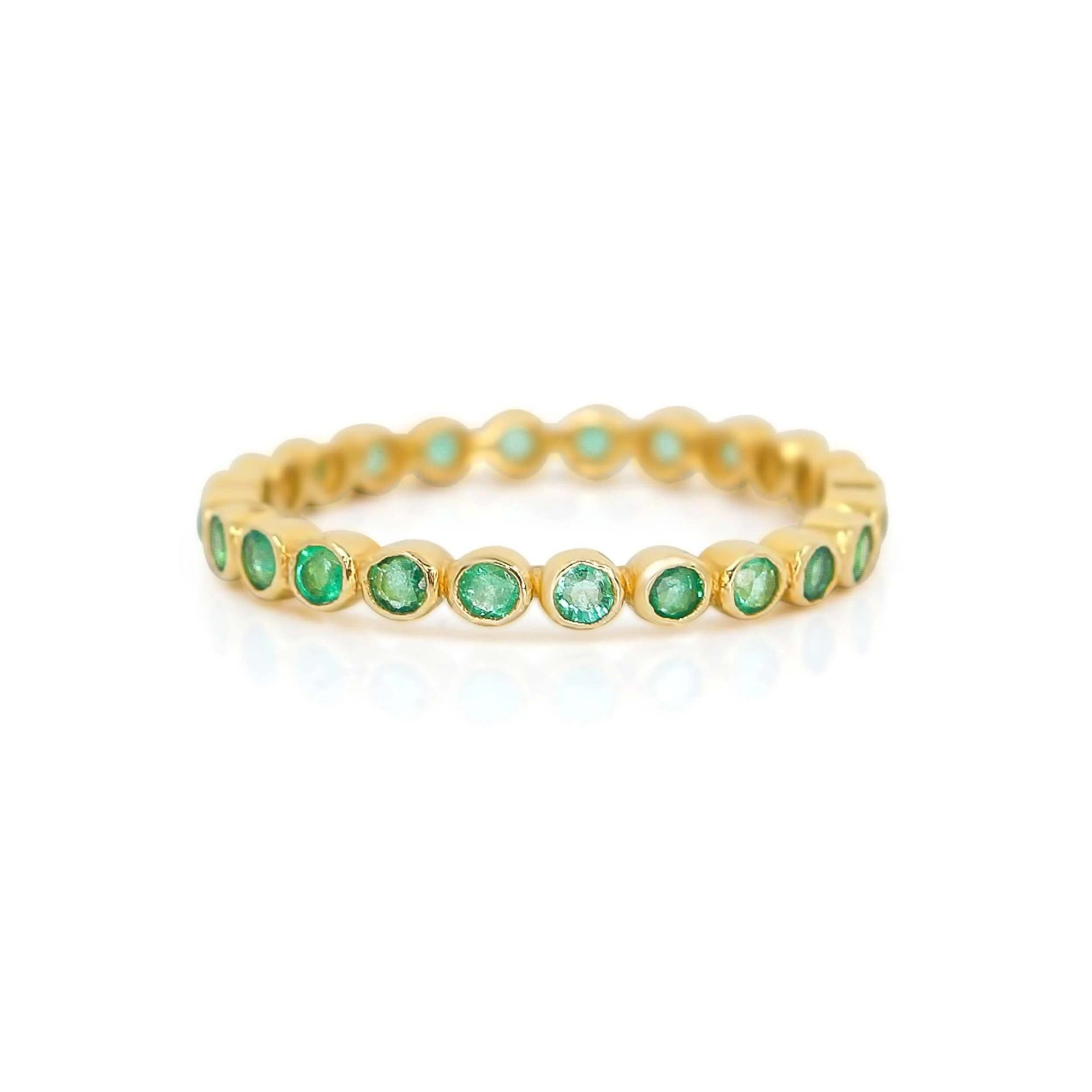 gold-emerald-bezel-eternity-ring