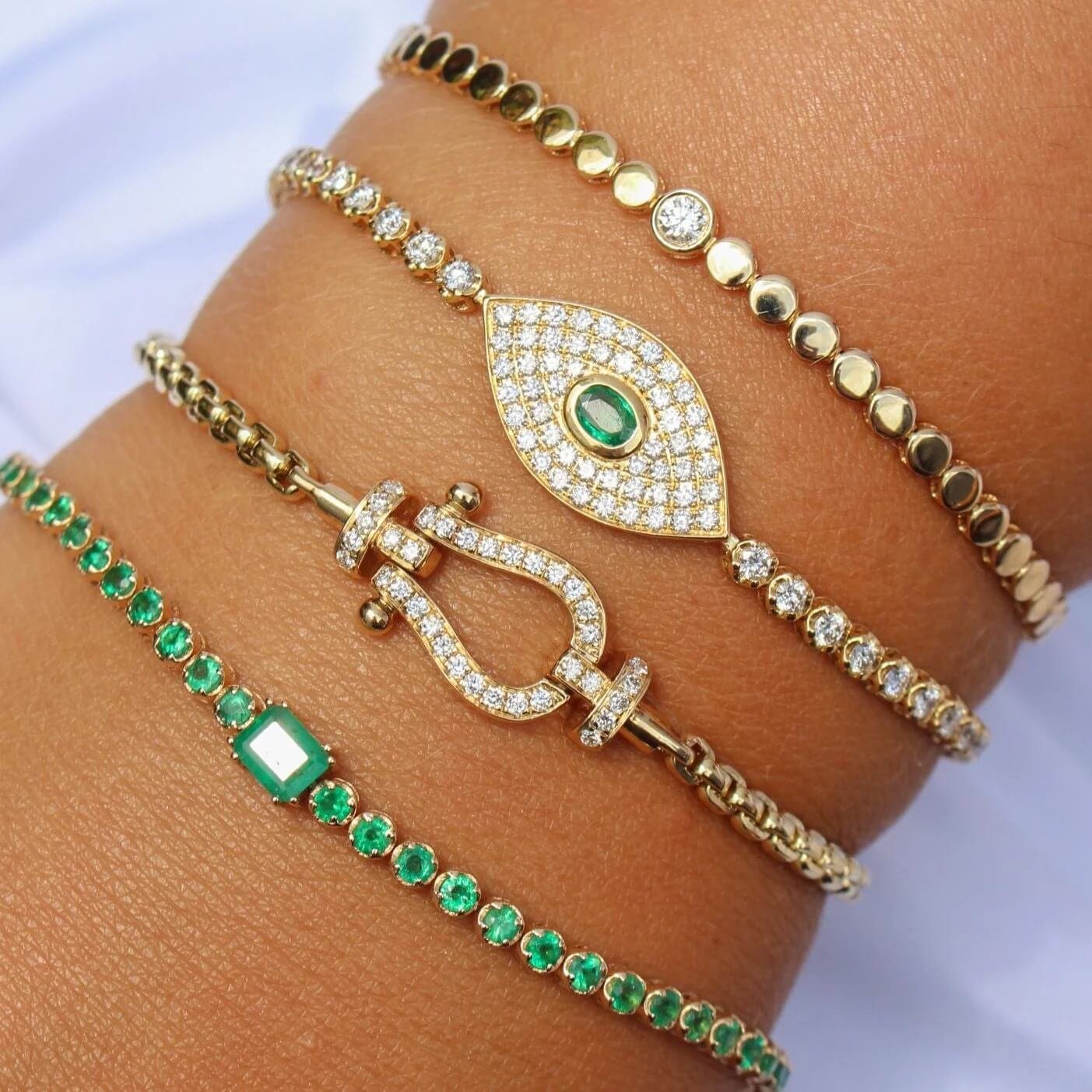 gold-pave-diamond-emerald-evil-eye-bracelet